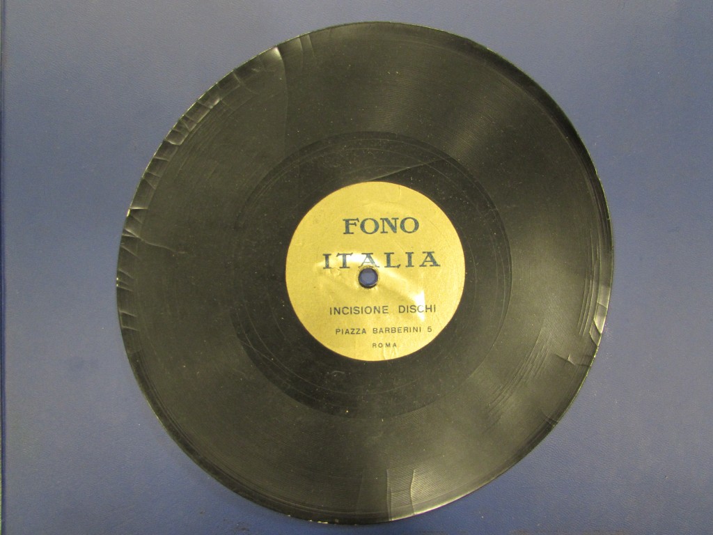 This mysterious Italian record turned out to hold another audio letter from Carl. It was able to be digitally preserved despite being very warped from age.