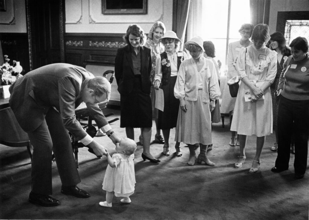 HERA group with children visiting the Illinois Governor.