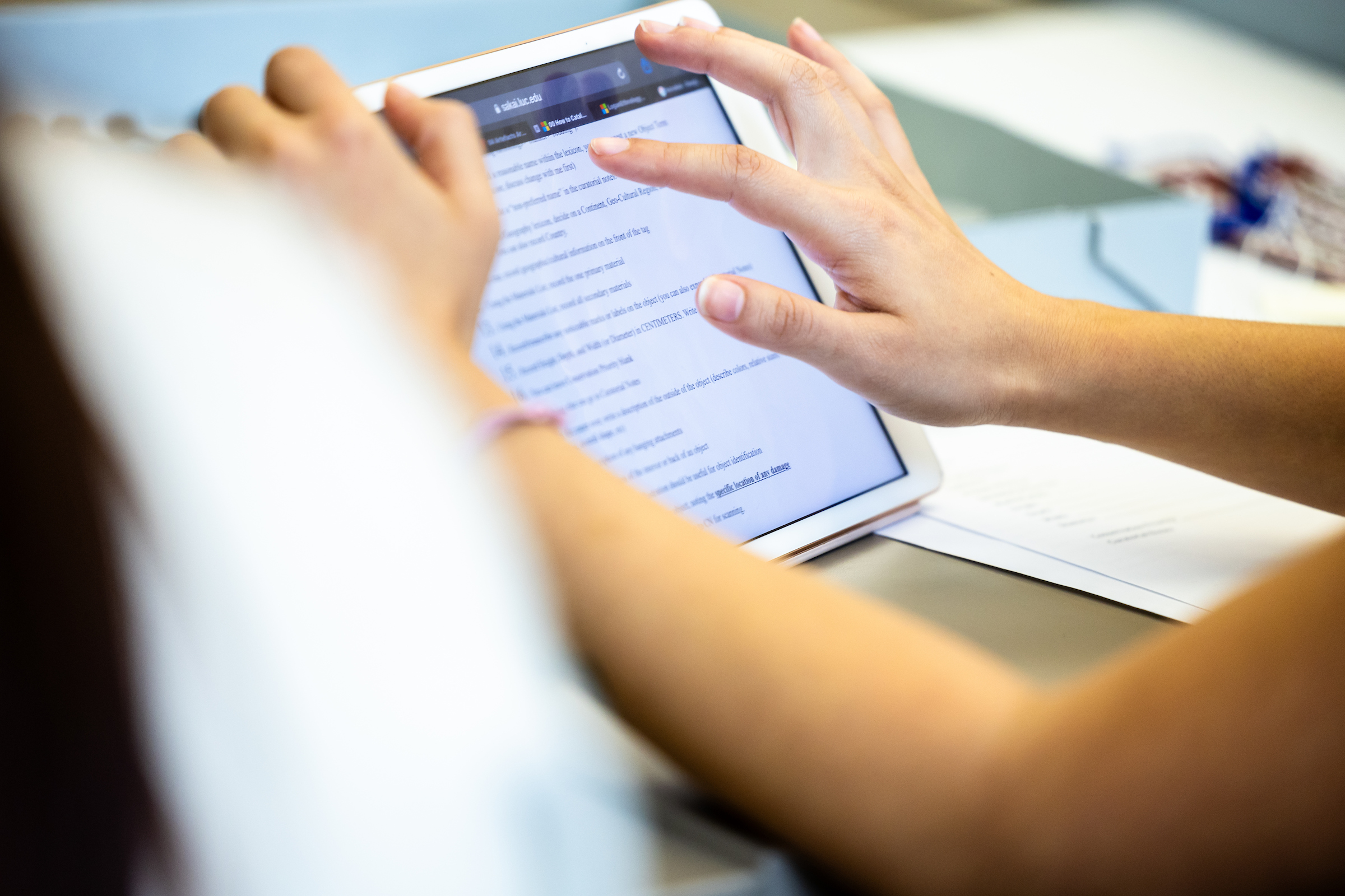 hands using a digital tablet