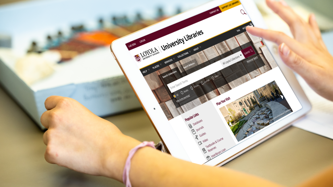 a person's finger touching the screen of a tablet