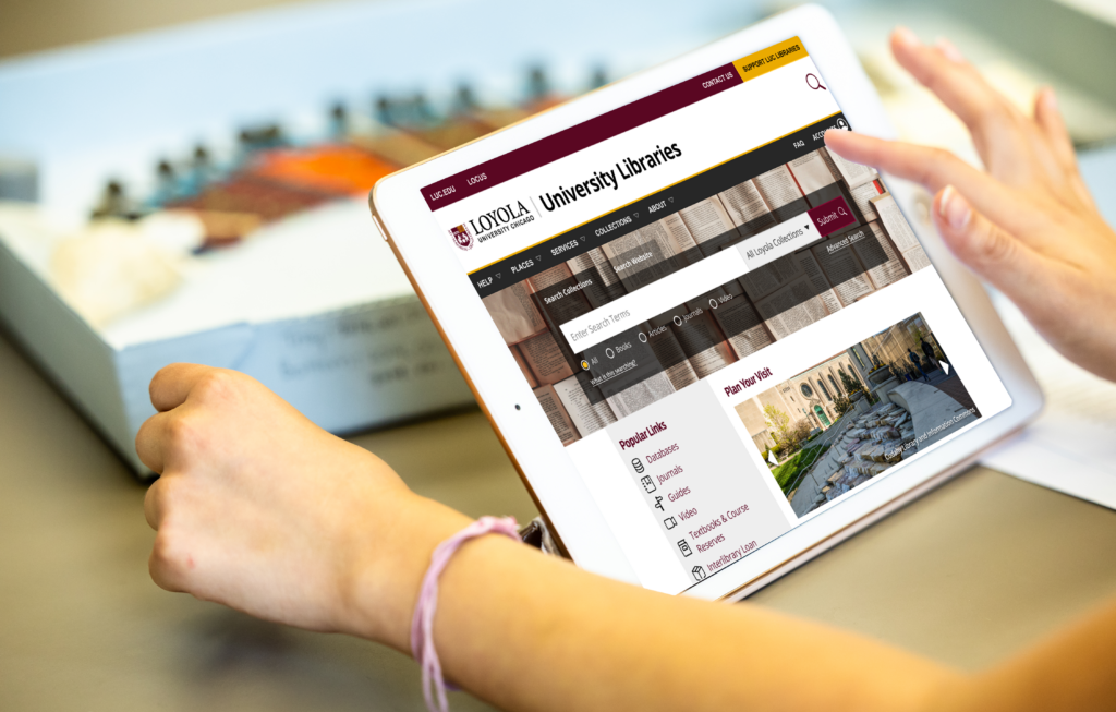 a person's finger touching the screen of a tablet