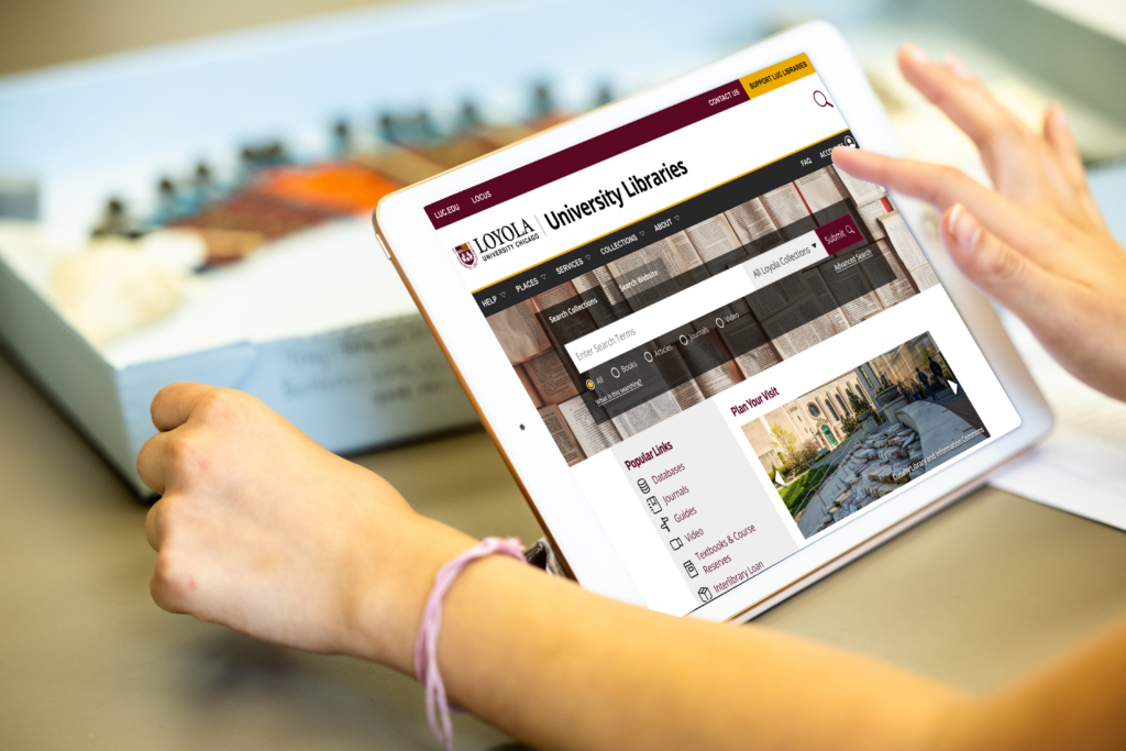 a person's finger touching the screen of a tablet